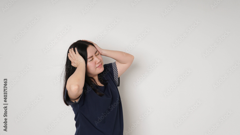 Young Asian woman got sick and headache isolated on white background Young Asian woman got sick and headache isolated on white background