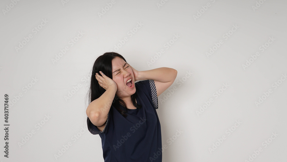 Portrait of angry pensive mad crazy asian woman screaming out . Portrait of angry pensive mad crazy asian woman screaming out .
