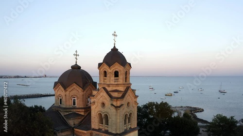 bird's eye view of the old church with two domes at sunset.