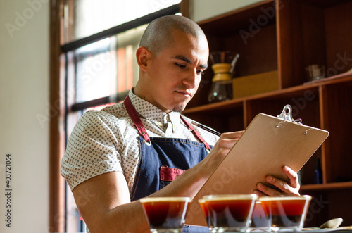 Professional coffee taster testing new smells and flavors