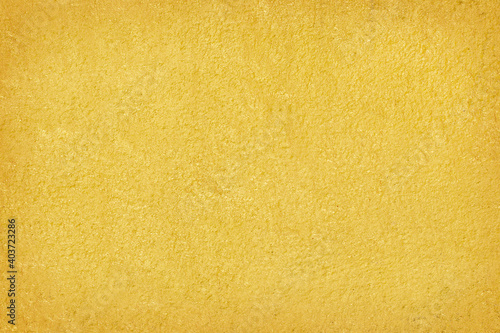 Gold cement wall texture abstract background