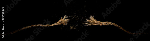 Billede på lærred Long dirty rope, frayed at both ends and snapped in two