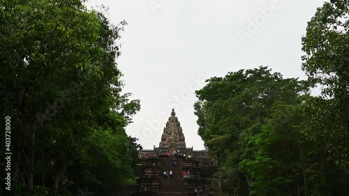 Phanom Rung Historical Park, Buriram; 4K footage of the Hindu shrine dedicated to Shiva as tourists and locals climb up and down the stone staircases to visit or pay homage. photo