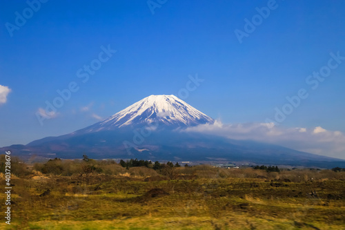 Beautiful Mount Fuji  japan.  Mount Fuji with green field and blue sky.