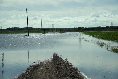 Emporia, Kansas 5-17-2015 Flooded road in Lyon County Kansas day after heavy thunderstorms and small tornado in the area yesterday 