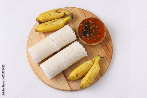 Fototapeta Naklejka Na Ścianę i Meble -  White rice puttu with chana curry