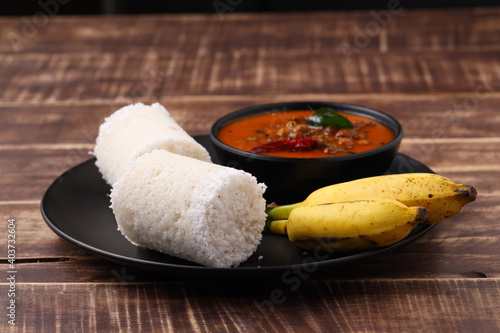 White rice puttu with chana masala curry photo