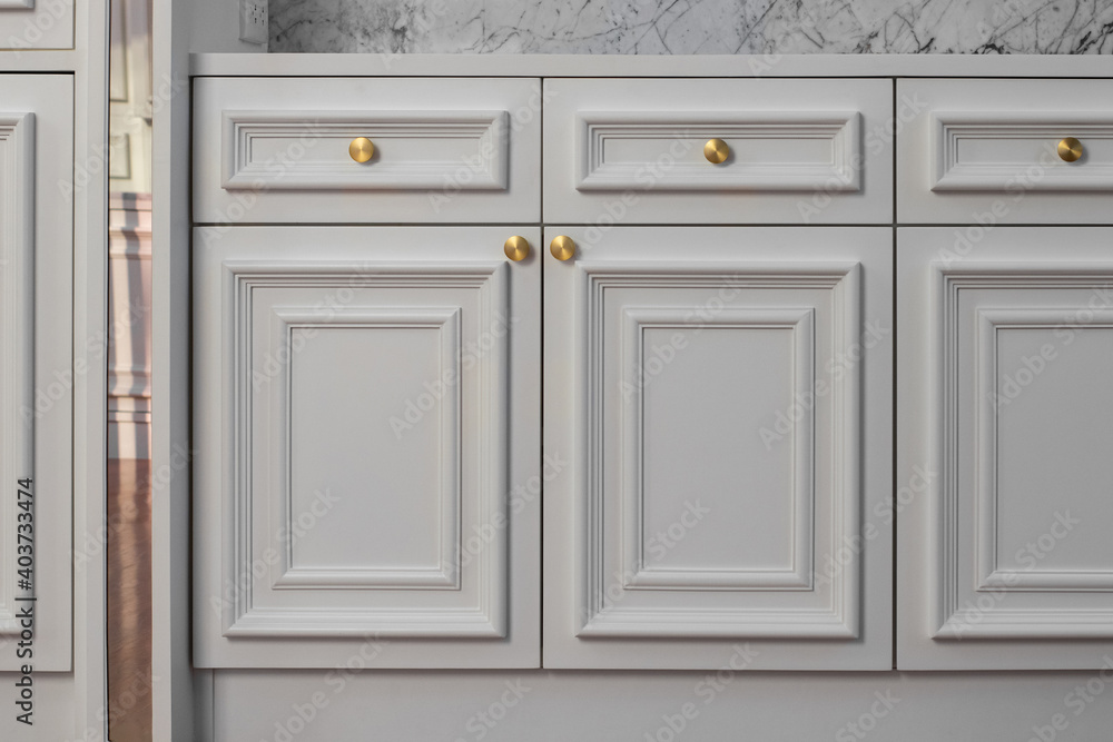 Close-up texture of white wood cabinets in house