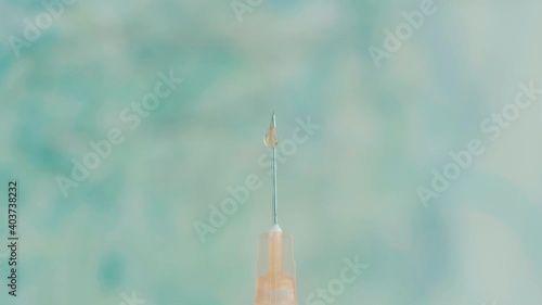 Retro Syringe with pale blue retro background