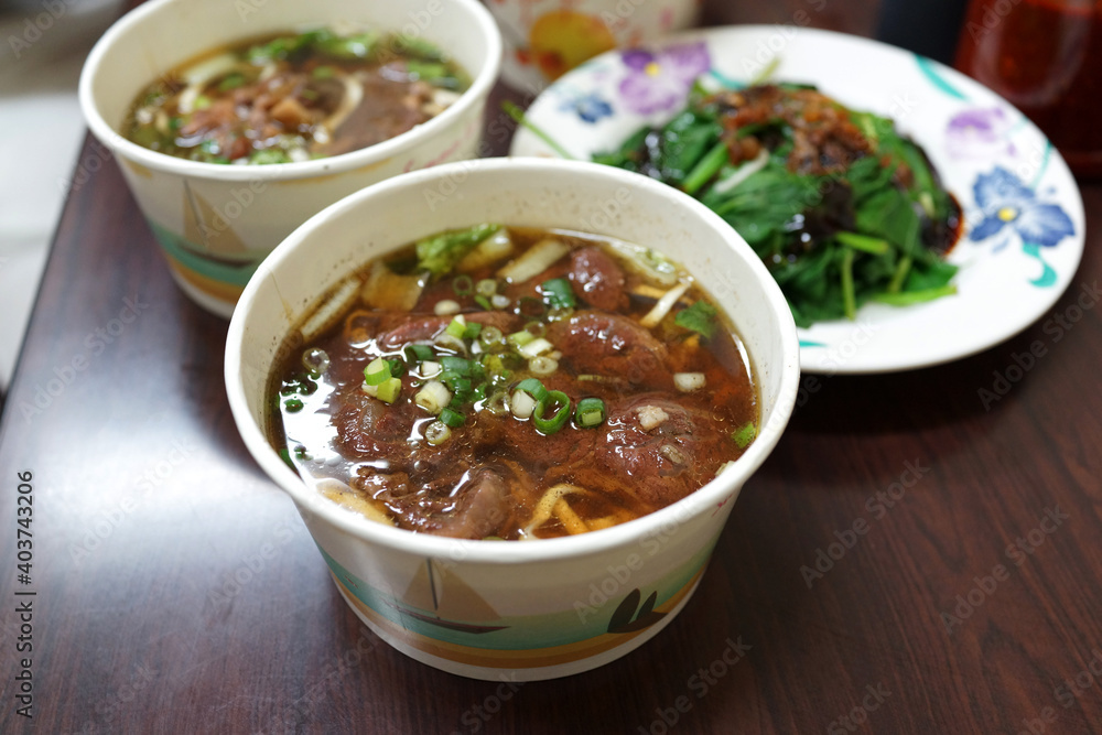 Taiwanese street food, beef noodles soup. The beef are stewed and