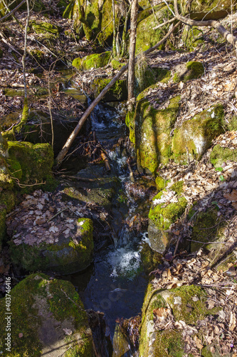 Small creek with rocks at spring © Lars Johansson
