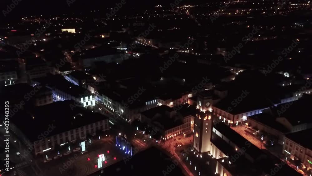 Portugal Sao Miguel Pontadelgada at night Igreja de Sao Sebastiao drone shot aerial view look from above moving city lights Portugal Sao Miguel Pontadelgada at night Igreja de Sao Sebastiao drone shot aerial view look from above moving city lights