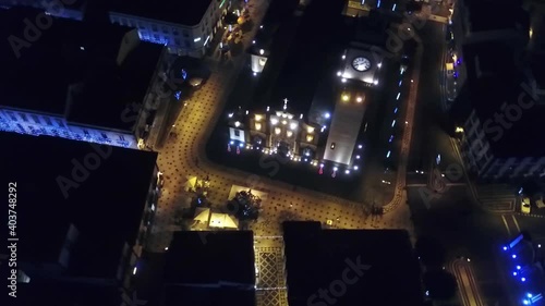 Portugal Sao Miguel Pontadelgada at night Igreja de Sao Sebastiao drone shot aerial view look from above city lights circular pan  photo