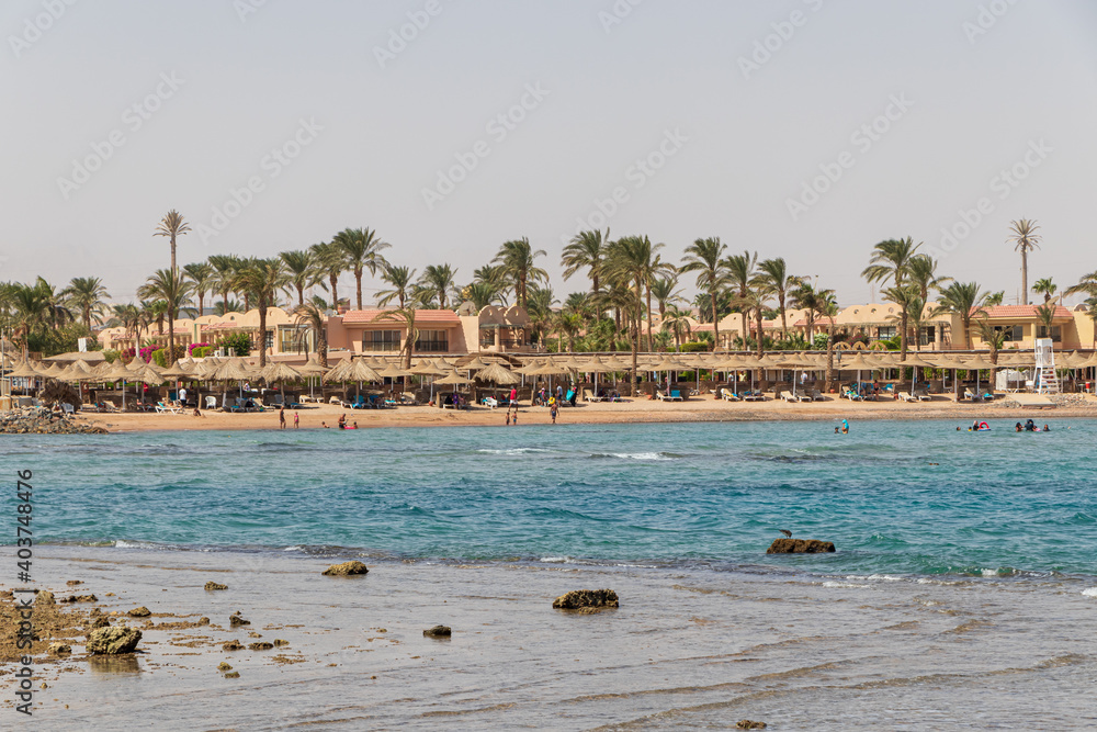 Hurghada, Egypt - September 29 2020: People relaxing on the beach in Hurghada, Egypt.