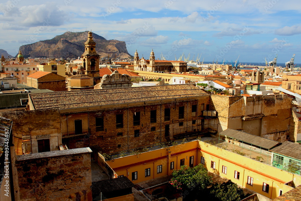 Palermo, Italy, September 03, 2017, Monastery of Santa Caterina, panoramic photo of the city from the monastery from which you can see a church and in the background the cranes of the port yard