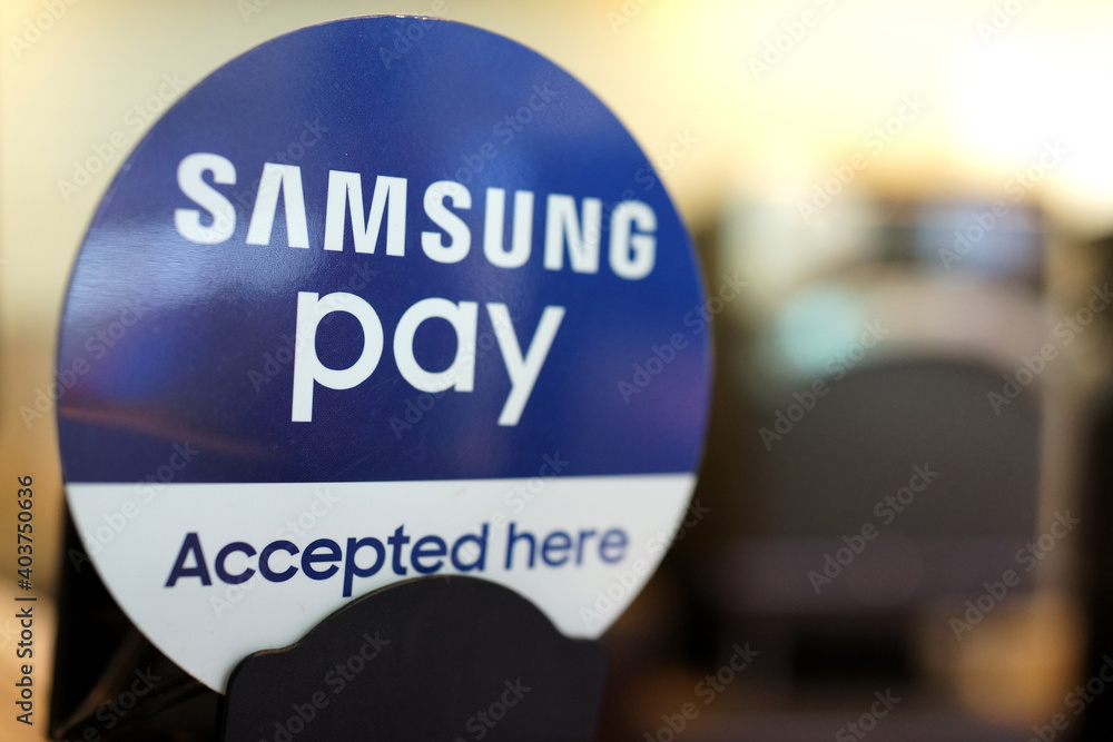 Samsung Pay Accepted Here sign in airport shopping store. Samsung Pay is a  mobile payment and digital wallet service by Samsung Electronics. PENANG,  MALAYSIA - JUNE 28, 2018. Photos | Adobe Stock