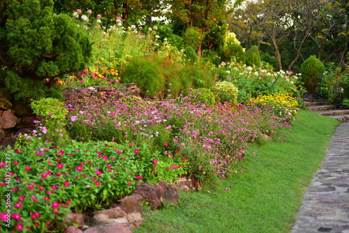 Fototapeta Naklejka Na Ścianę i Meble -  Spring Formal Garden. Beautiful garden of colorful flowers.Landscaped Formal Garden. Park. Beautiful Garden	