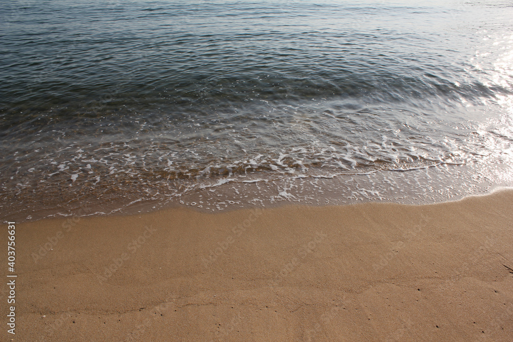 Soft beautiful ocean wave on sandy beach. Background Soft beautiful ocean wave on sandy beach. Background
