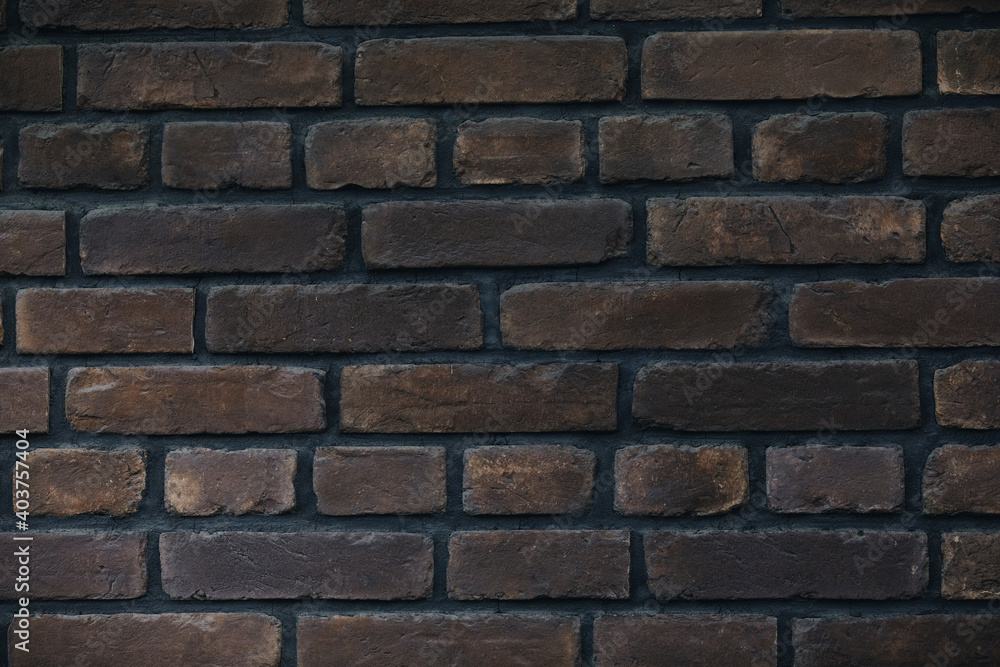 old dark brown brickwork wall background