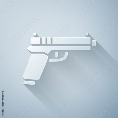 Paper cut Pistol or gun icon isolated on grey background. Police or military handgun. Small firearm. Paper art style. Vector.
