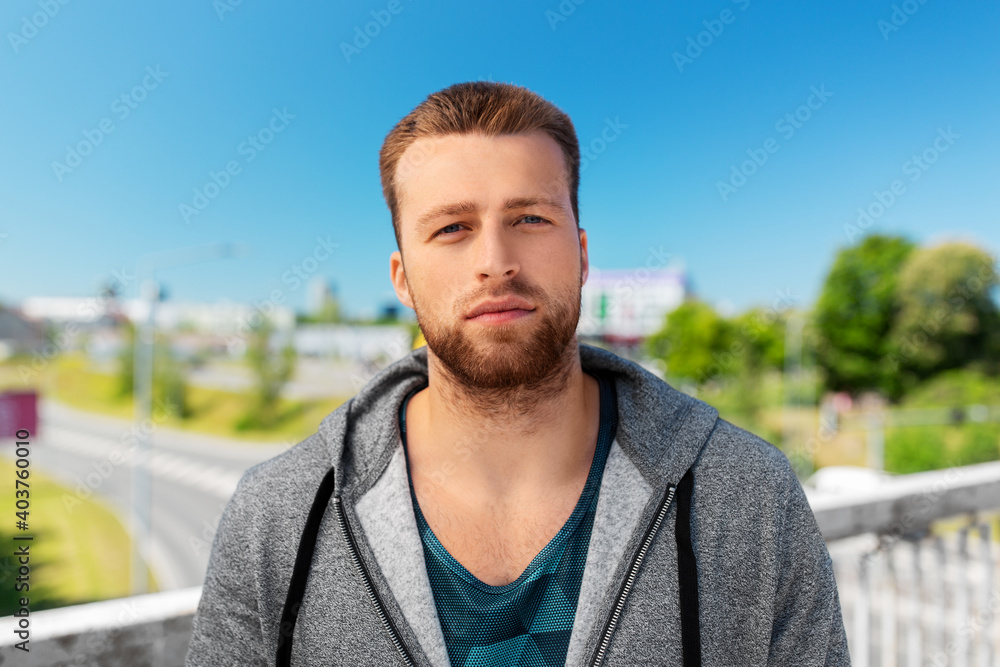 fitness, sport and people concept - portrait of young man outdoors fitness, sport and people concept - portrait of young man outdoors