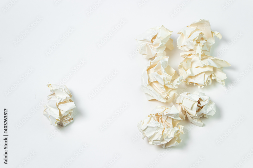 Crumpled paper on a white background. A pile of crumpled paper. Creative crisis. Lack of ideas Crumpled paper on a white background. A pile of crumpled paper. Creative crisis. Lack of ideas