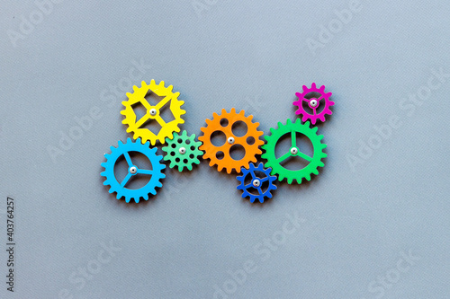 Top view of colorful gears. Corporate work and modern business process concept photo