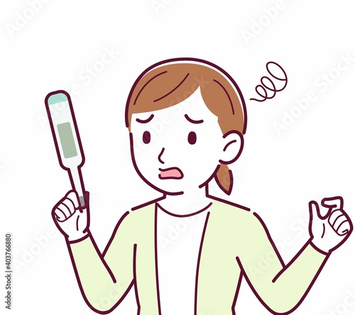 Young woman in a cardigan_Thermometer