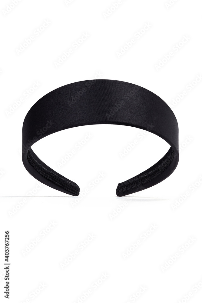 Subject shot of black silk headband with satin gloss. The wide hair holder is isolated on the white background. Subject shot of black silk headband with satin gloss. The wide hair holder is isolated on the white background.