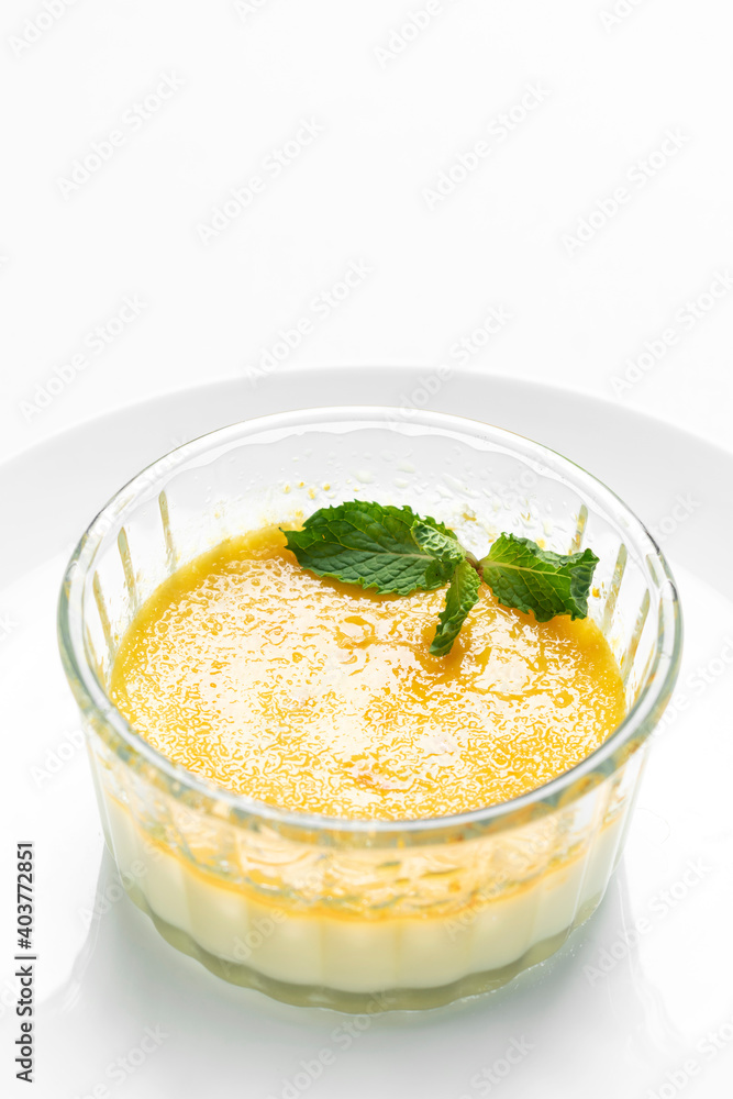 vegan dairy free organic coconut creme brulee on white background vegan dairy free organic coconut creme brulee on white background