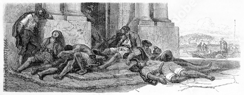 Obraz na plátně poor men having an outdoors afternoon nap on a church entrance stairway in Naples, Italy