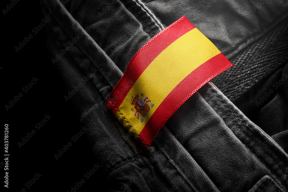 Tag on dark clothing in the form of the flag of the Spain