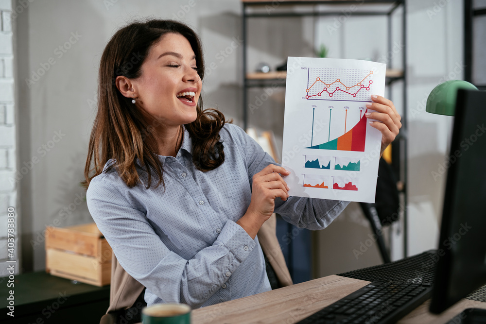 Businesswoman is having a video call on computer. Beautiful woman having meeting online..