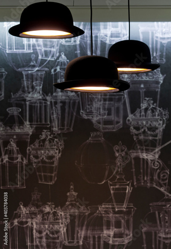 Bowler hats as light fittings photo