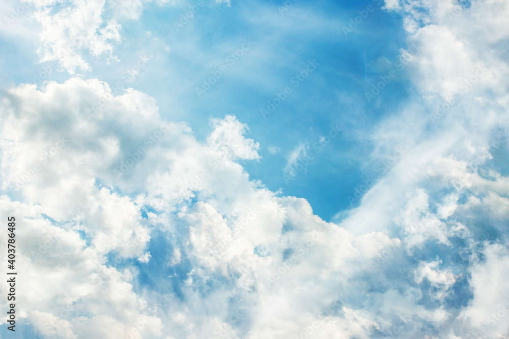 Heaven background. Cloudy sky background. Peaceful bright blue sky texture. Fluffy clouds on the sky background. Cloudscape view. Heaven background. Cloudy sky background. Peaceful bright blue sky texture. Fluffy clouds on the sky background. Cloudscape view.