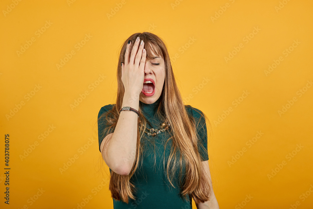 Covering eyes with hand but peeking through fingers. My eye see everything. Studio shot of sincere pretty caucasian, I can not hold promise. Charming playful. Wanting to distinguish surprise. Covering eyes with hand but peeking through fingers. My eye see everything. Studio shot of sincere pretty caucasian, I can not hold promise. Charming playful. Wanting to distinguish surprise.