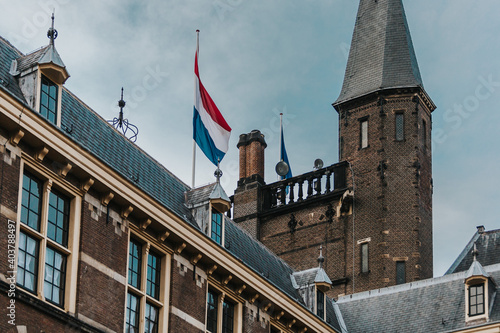 Parlament of Netherlands in Hague and NL flag (ID: 403788497)
