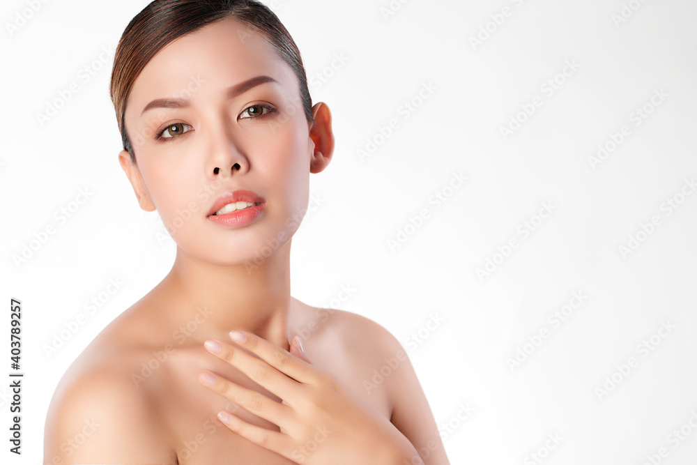 Beautiful Young asian Woman with Clean Fresh Skin, on Pink background, Face care, Facial treatment. Cosmetology, beauty and spa. Asian women portrait Beautiful Young asian Woman with Clean Fresh Skin, on Pink background, Face care, Facial treatment. Cosmetology, beauty and spa. Asian women portrait