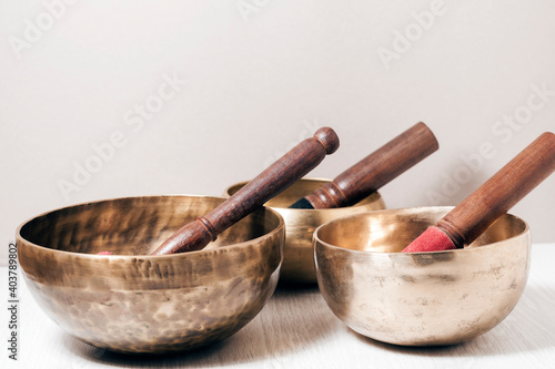 Three Tibetan bowls on the table. Meditation, relaxation, yoga, music.