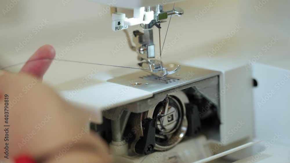 installation of threads into the sewing machine installation of threads into the sewing machine