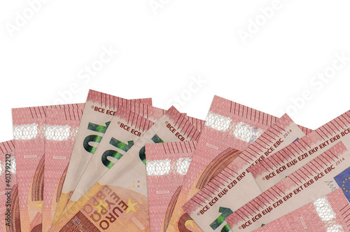 10 euro bills lies on bottom side of screen isolated on white background with copy space. Background banner template photo