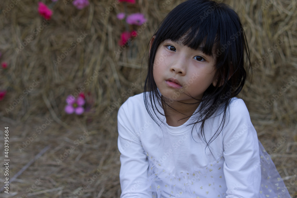 Portrait Asian Thailand kids cute little girl In white dress Portrait Asian Thailand kids cute little girl In white dress