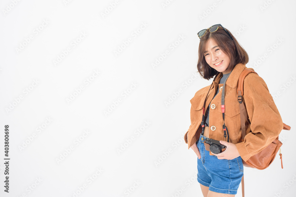 Beautiful young asian tourist woman happy on white background studio Beautiful young asian tourist woman happy on white background studio