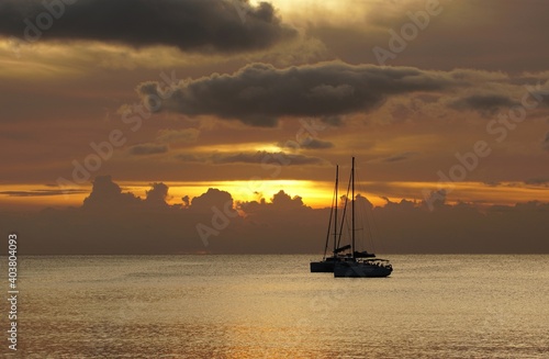 sunset over the sea wth boats