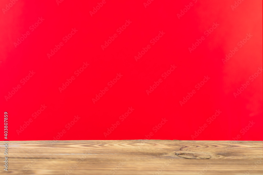 Wooden board empty table in front of a blurred background. Perspective brown wood with a blurry multi-colored background - can be used to showcase or assemble your products. Mock up Wooden board empty table in front of a blurred background. Perspective brown wood with a blurry multi-colored background - can be used to showcase or assemble your products. Mock up
