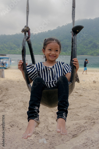 child playing on the beach