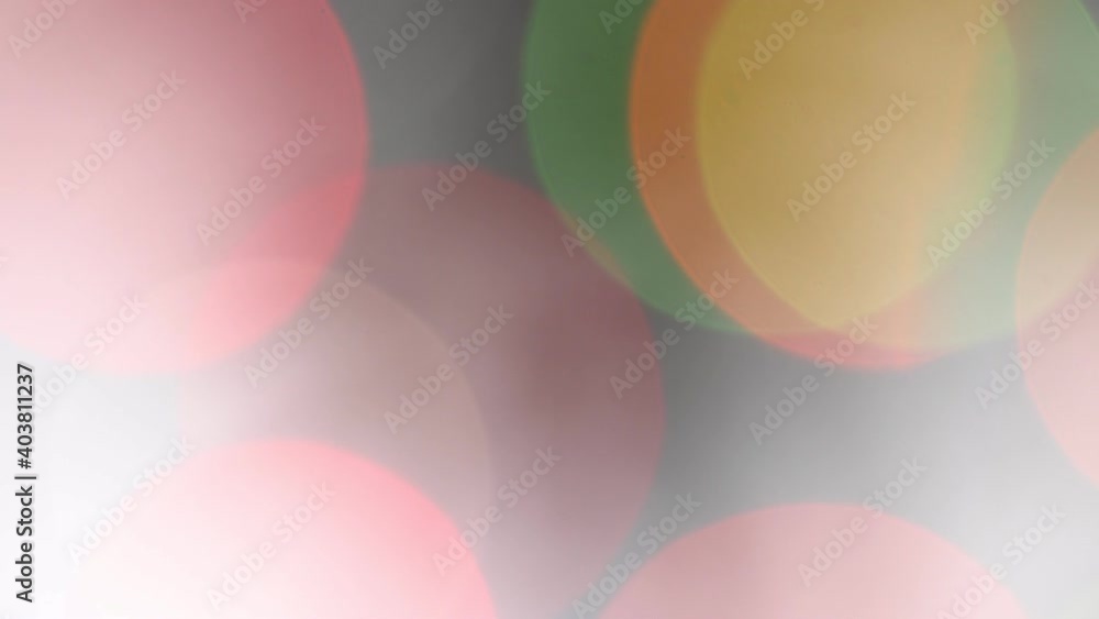 Shimmering abstract colored circles defocused christmas lights video. Blurred fairy lights. Out of focus holiday background. Xmas and New Year theme. 4k Shimmering abstract colored circles defocused christmas lights video. Blurred fairy lights. Out of focus holiday background. Xmas and New Year theme. 4k