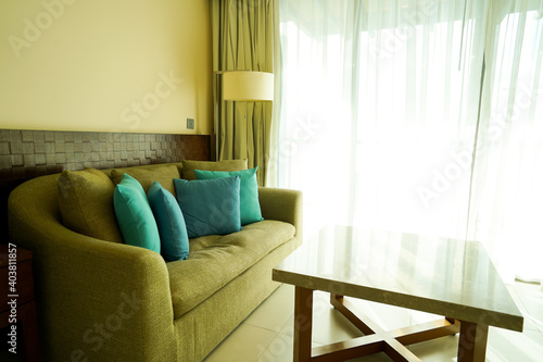 modern green sofa with lamp in the living room