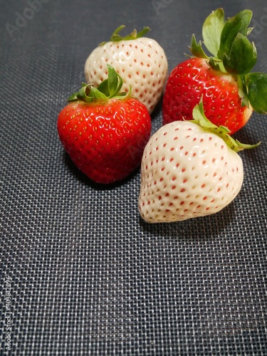 White strawberries and red strawberries