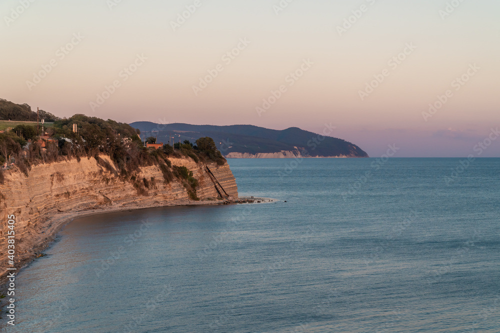 Summer view of Cape Tolstoy in Gelendzhik in the sun at sunset.